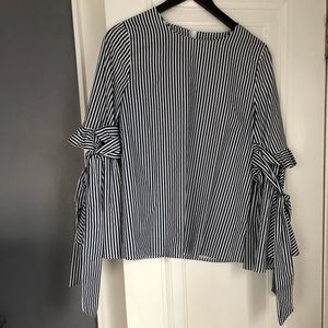 Women’s size medium blouse with bell sleeves